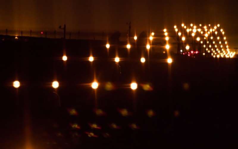 A pilots view at night after a color blind test.