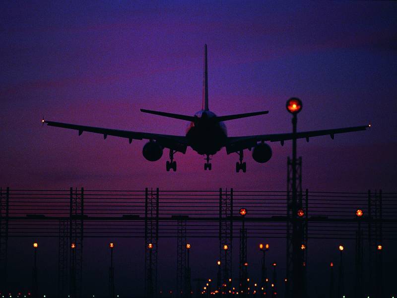 Airplane landing at night
