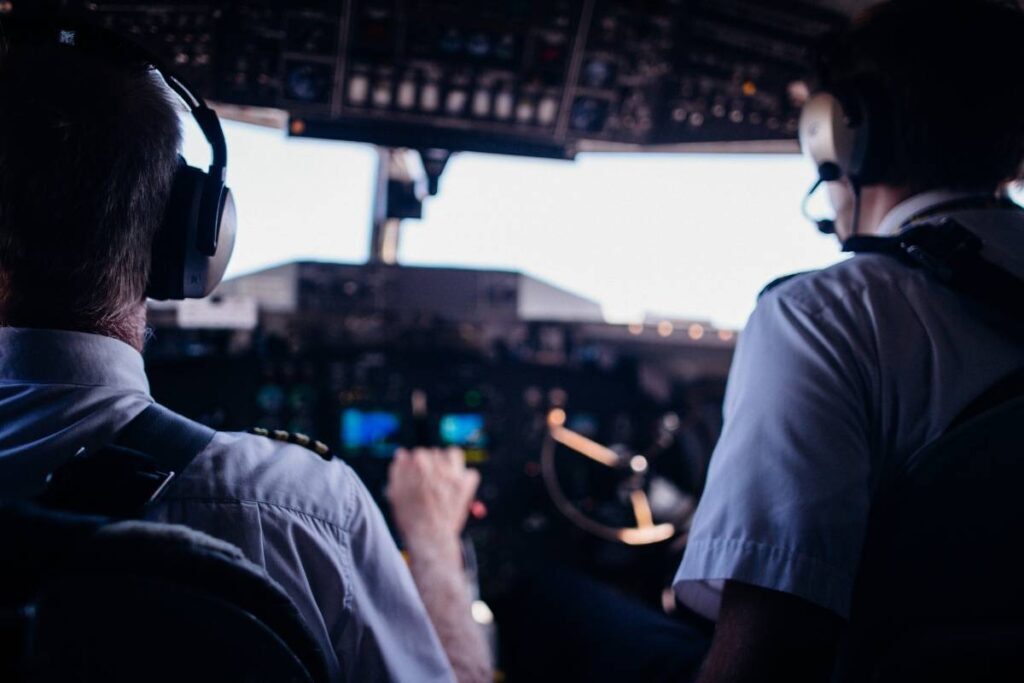 pilots in the cockpit using crew resource management