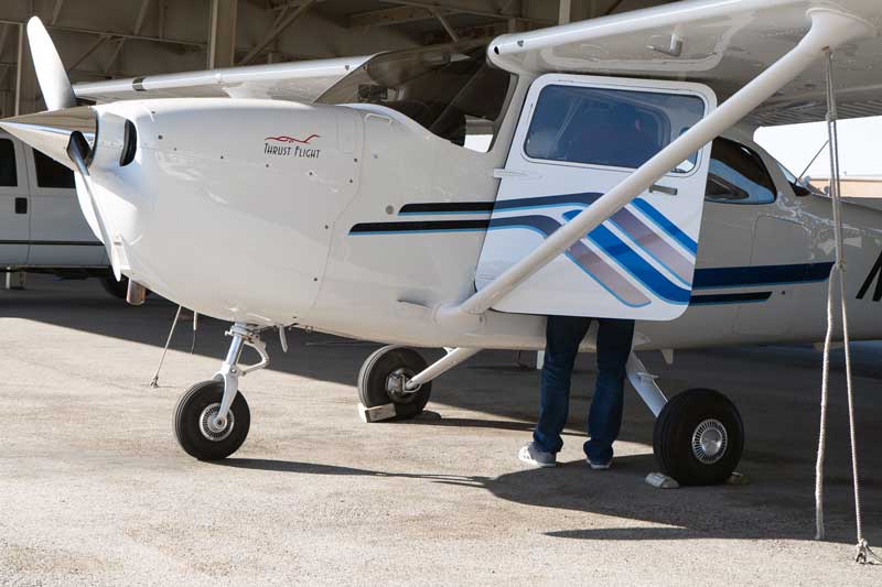 flight instructor checking the plane