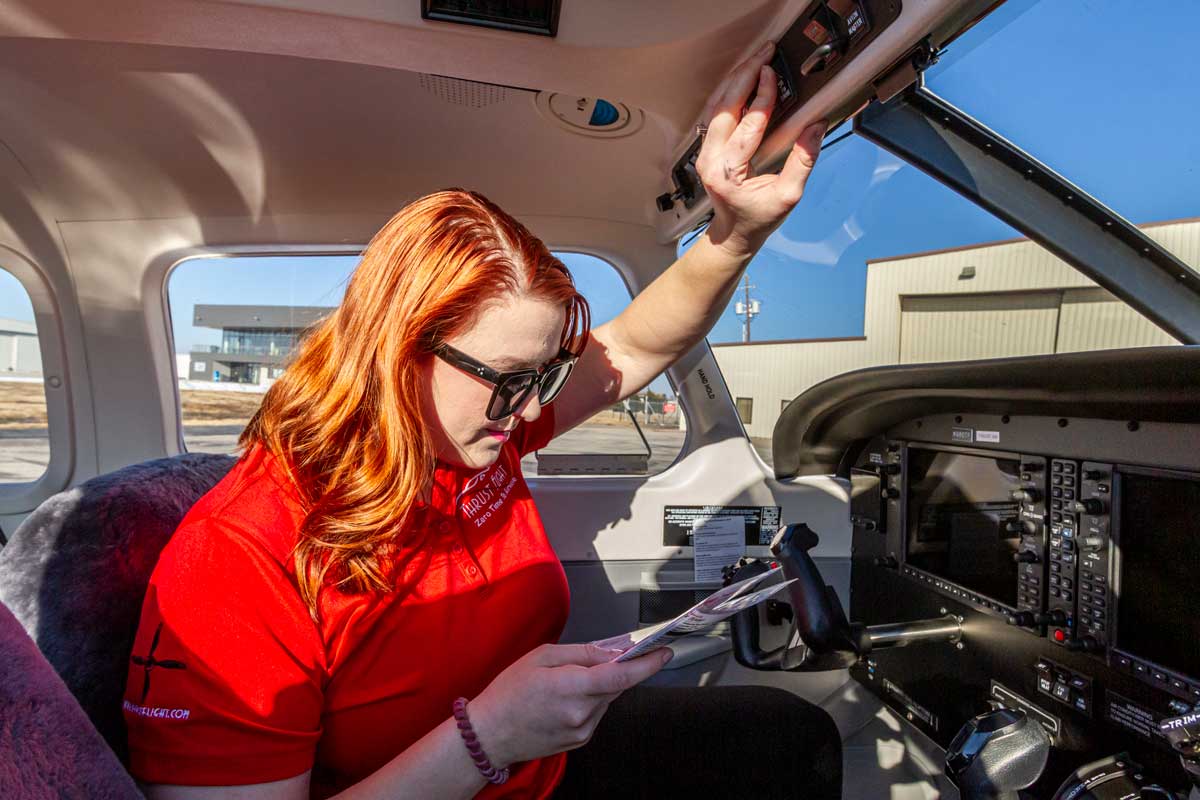 Zero Time to Airline student preflighting a Piper Archer