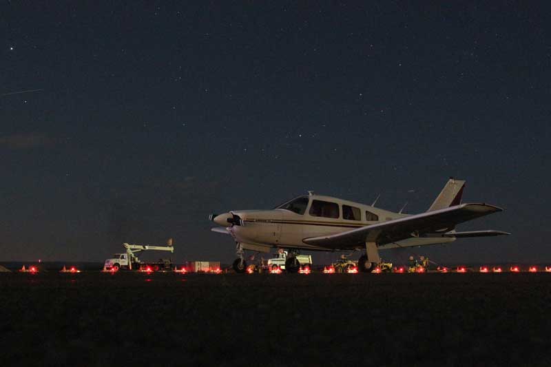 Plane on the ramp at night