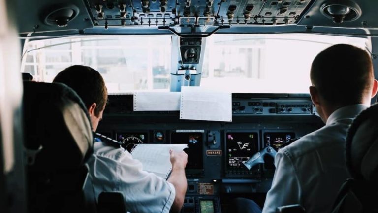 two airline pilots in the cockpit