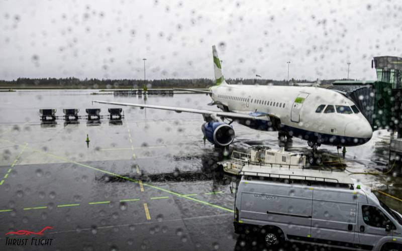Airplane preparing to fly in the rain